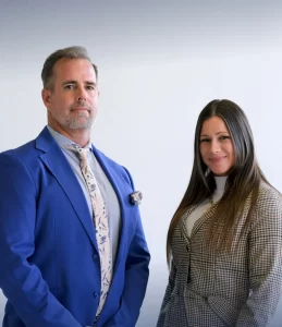 Headshot of founding Oklahoma City criminal defense attorney, Joshua A. Lee and legal assistant, Carissa Crim